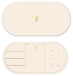 Compact cream-colored oval jewelry case with lid and three sections inside