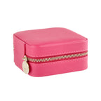 Pink travel jewelry case with rounded corners, ring roll, and compartments for earrings, rings, and necklaces